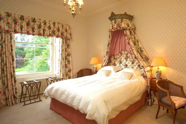 A colour image of a double room with ensuite at Edradynate Country House and Sporting Estate Scotland. Edradynate is available for rent, shoot days, fishing and family holidays on a catered or self catered basis.