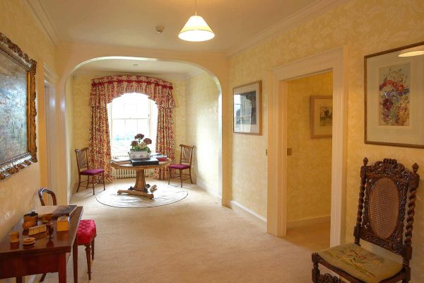 A colour image of the upstairs landing and hallway at Edradynate Country House and Sporting Estate Scotland. Edradynate is available for rent, shoot days, fishing and family holidays on a catered or self catered basis.