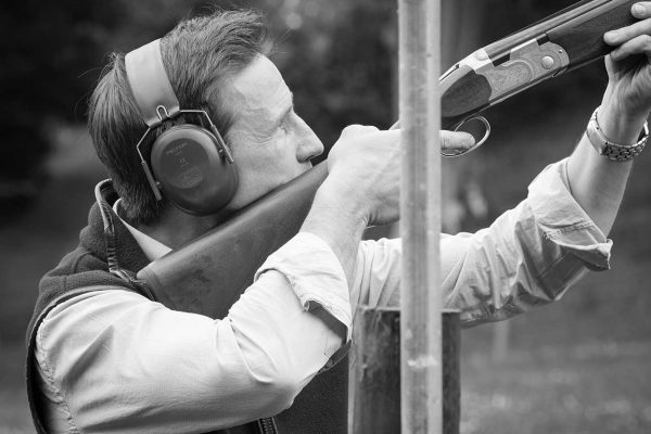 A black and white photo of a guest enjoying clay pigeon shooting at the Edradynate clay pigeon shoot day May 2017 - Edradynate Estate, Perthshire - Luxury Country House and Sporting Estate for Rent in Scotland