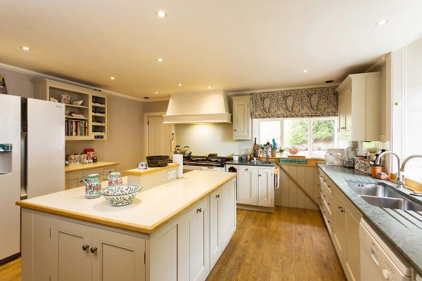 An image of the shaker style kitchen at Edradynate Country House and Sporting Estate Scotland. Edradynate is available for rent, shoot days, fishing and family holidays on a catered or self catered basis.