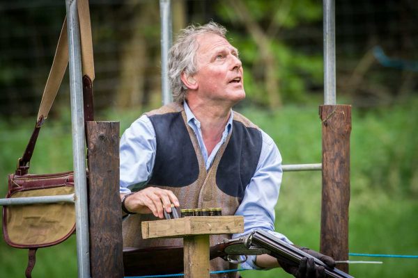 A colour image of a gentleman loading cartridges at the Edradynate May 2017 clay shooting day - Edradynate Estate, Perthshire - Luxury Country House and Sporting Estate for Rent in Scotland