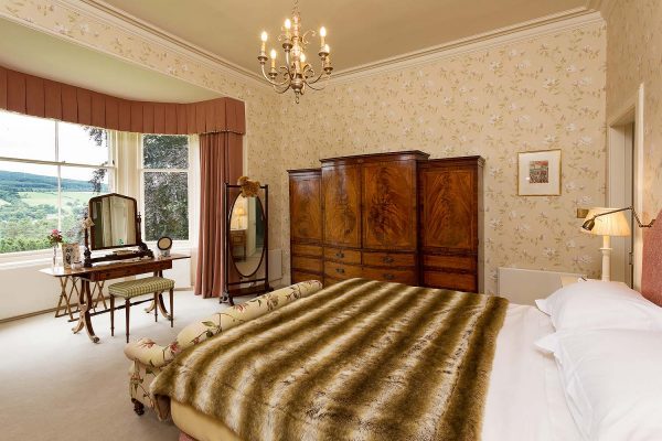 An image of the recently decorated master bedroom with ensuite at Edradynate Country House and Sporting Estate Scotland,