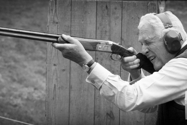 A black and white image of Michael Campbell clay pigeon shooting at the Edradynate shoot day in May 2017 -Edradynate Estate, Perthshire - Luxury Country House and Sporting Estate for Rent in Scotland