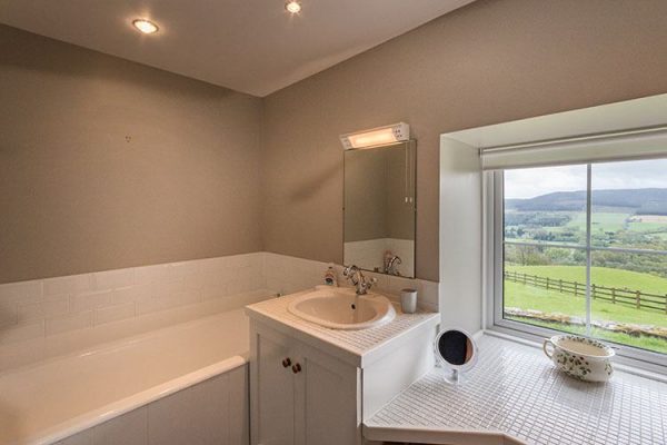 A colour image of a bathroom at Aodin - accommodation for a a self catering holiday Scotland - Edradynate Country House and Sporting Estate Perthshire