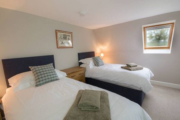 A colour image of a twin bedroom at Aodin accommodation for a a self catering holiday Scotland Edradynate Country House and Sporting Estate Perthshire