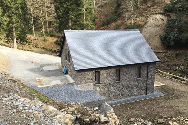 A colour image of the turbine house of the Beinn Eagagach Hydro Scheme at Edradynate Estate Perthshire